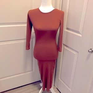 Ladies long sleeve rust color dress.